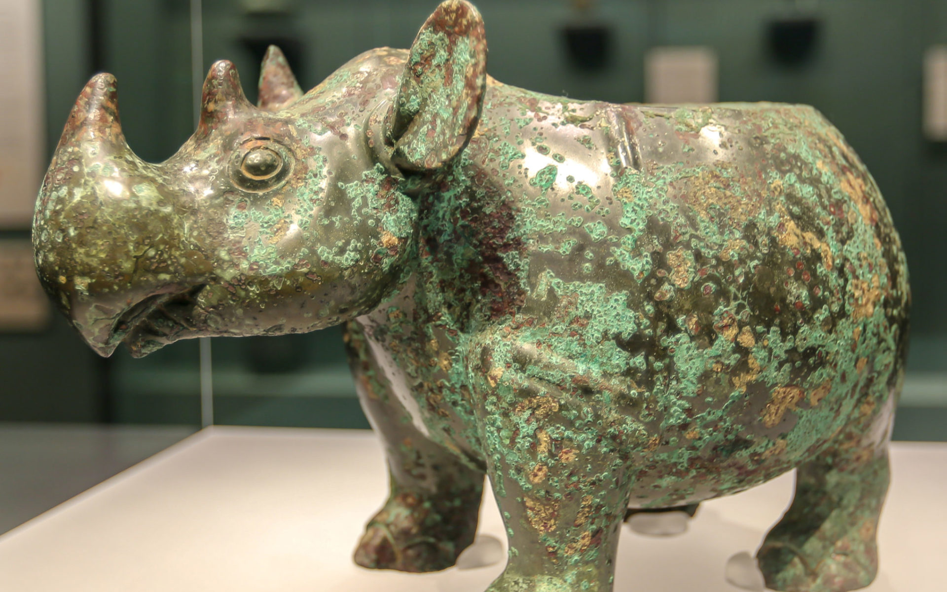 Bronze vessel in the shape of a rhino.