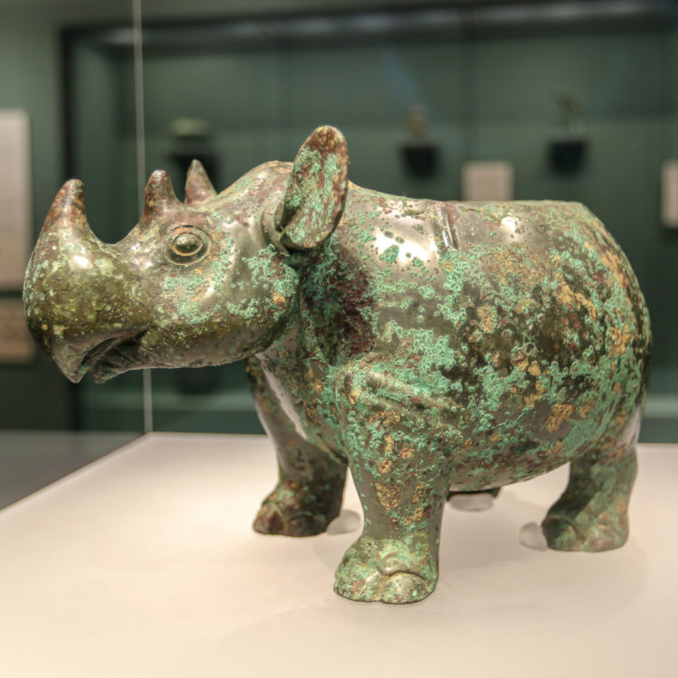 Bronze vessel in the shape of a rhino.