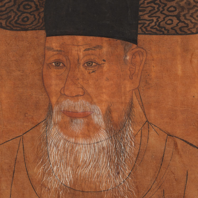 Portrait of the bust of a man with a tall and flaring black hat and long white beard.