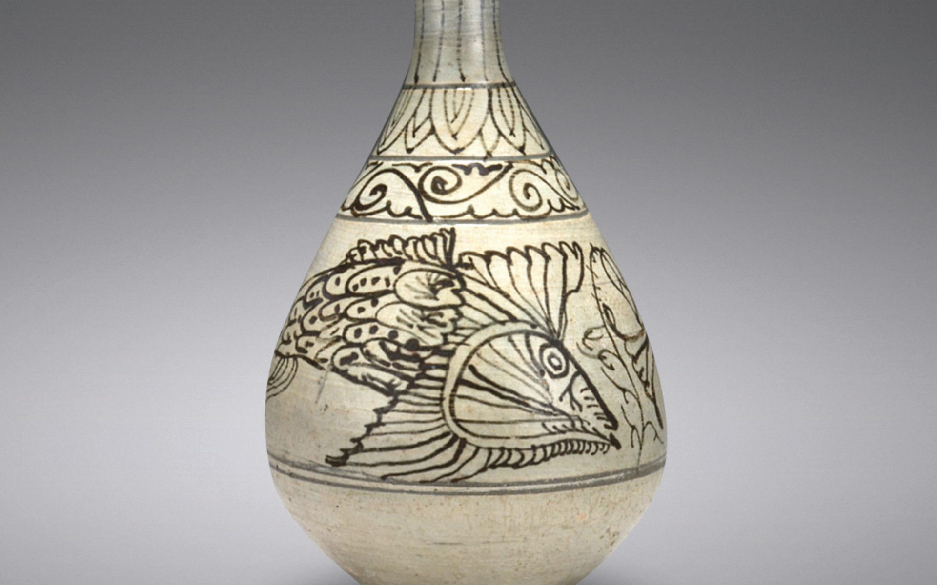 Bottle with fish design.