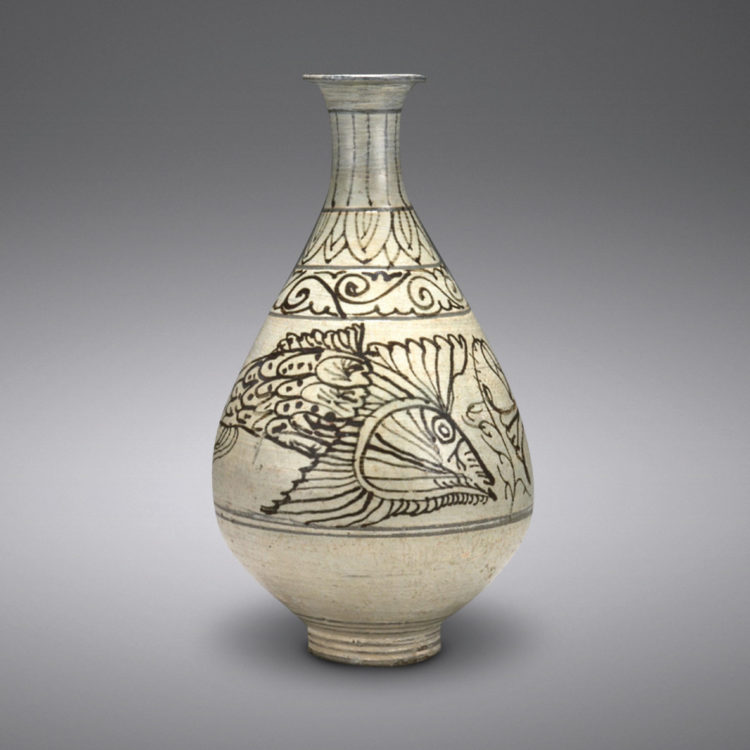 Bottle with fish design.