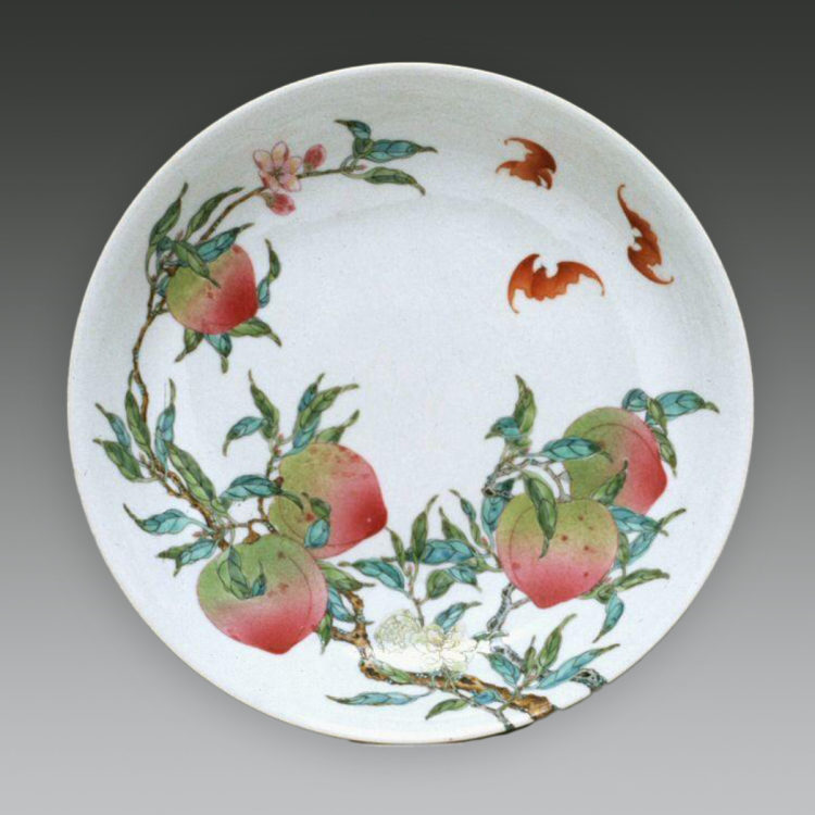 PLATE WITH EIGHT PEACHES AND FIVE BATS, ONE OF A PAIR